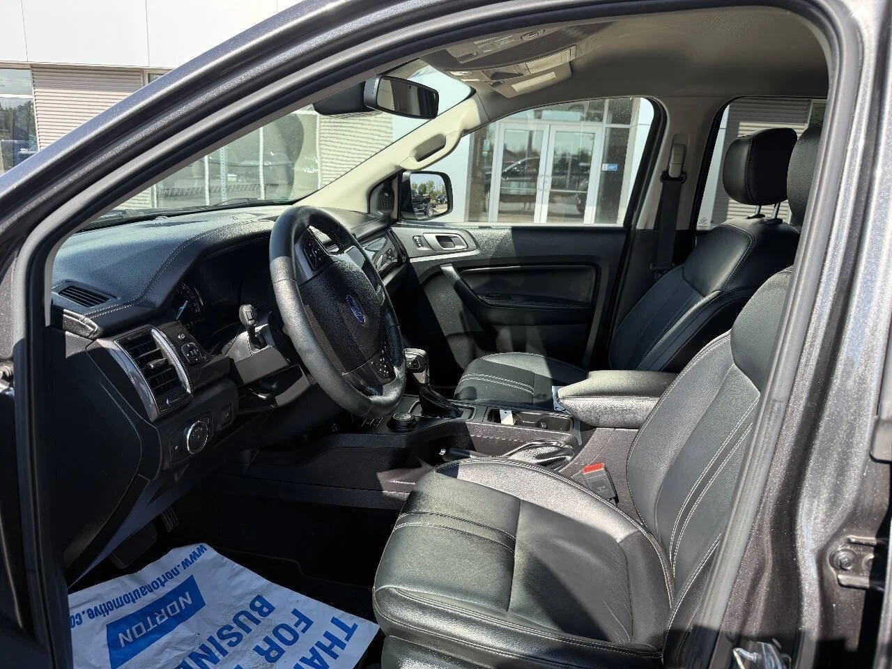 Used 2020 Magnetic Ford Lariat 4x4 4dr SuperCrew 5.1 ft. SB image 13