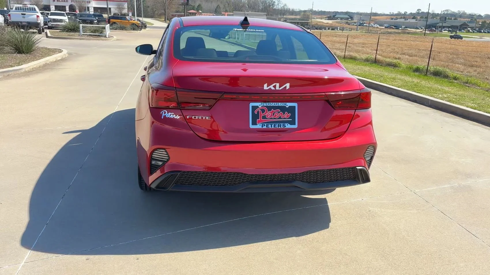Used 2024 Currant Red Kia LXS image 7