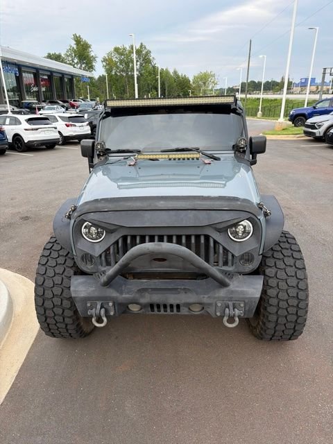 Used 2014 Gray Jeep Sport image 4
