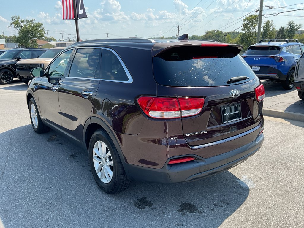 Used 2016 Dark Cherry Kia LX image 7