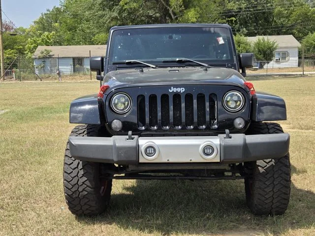 Used 2014 Black Jeep Unlimited Sahara image 2