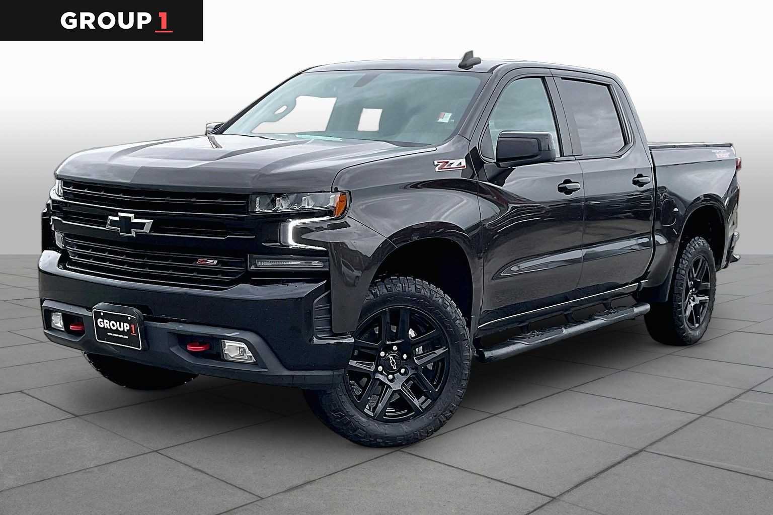 Used 2021 OXFORD BROWN METALLIC Chevrolet LT Trail Boss image 1