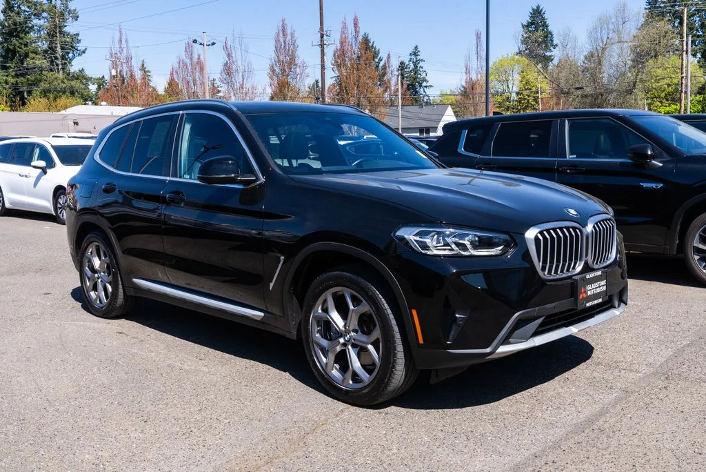 Used 2023 Black BMW xDrive30i image 1