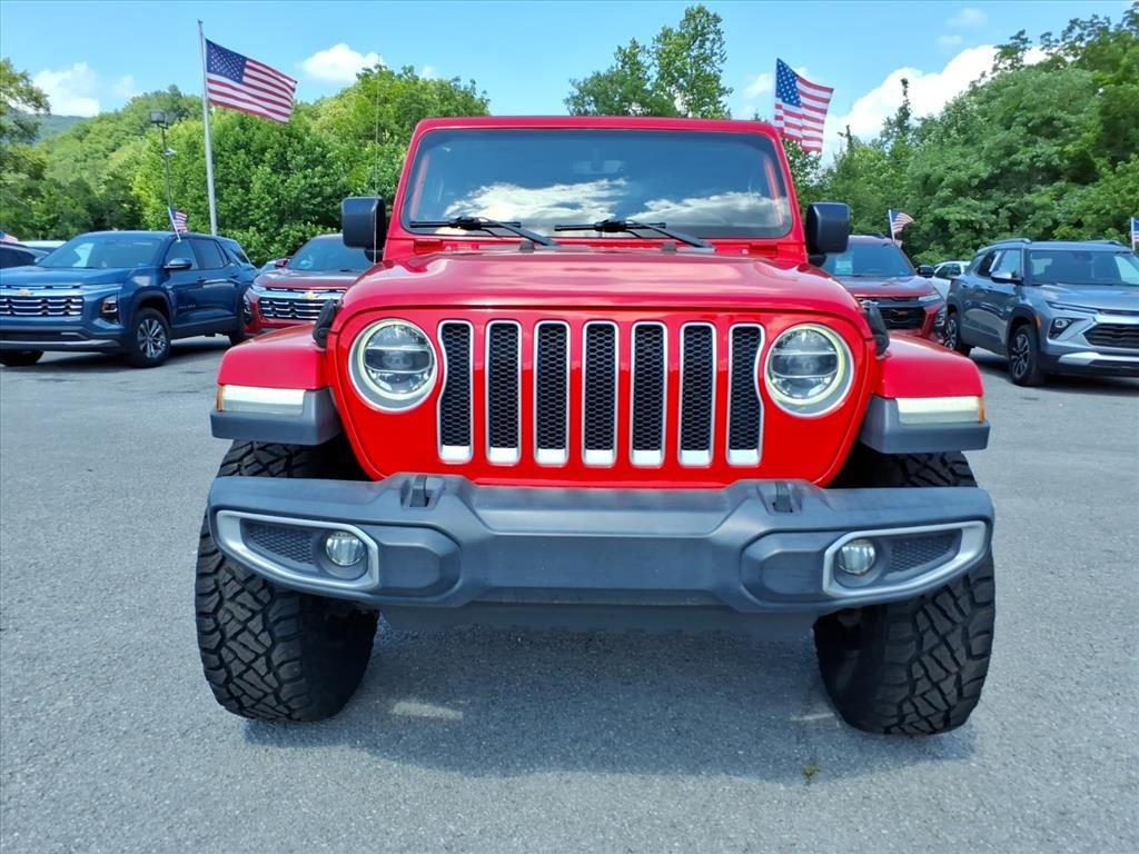 Used 2018 Red Jeep Unlimited Sahara image 9