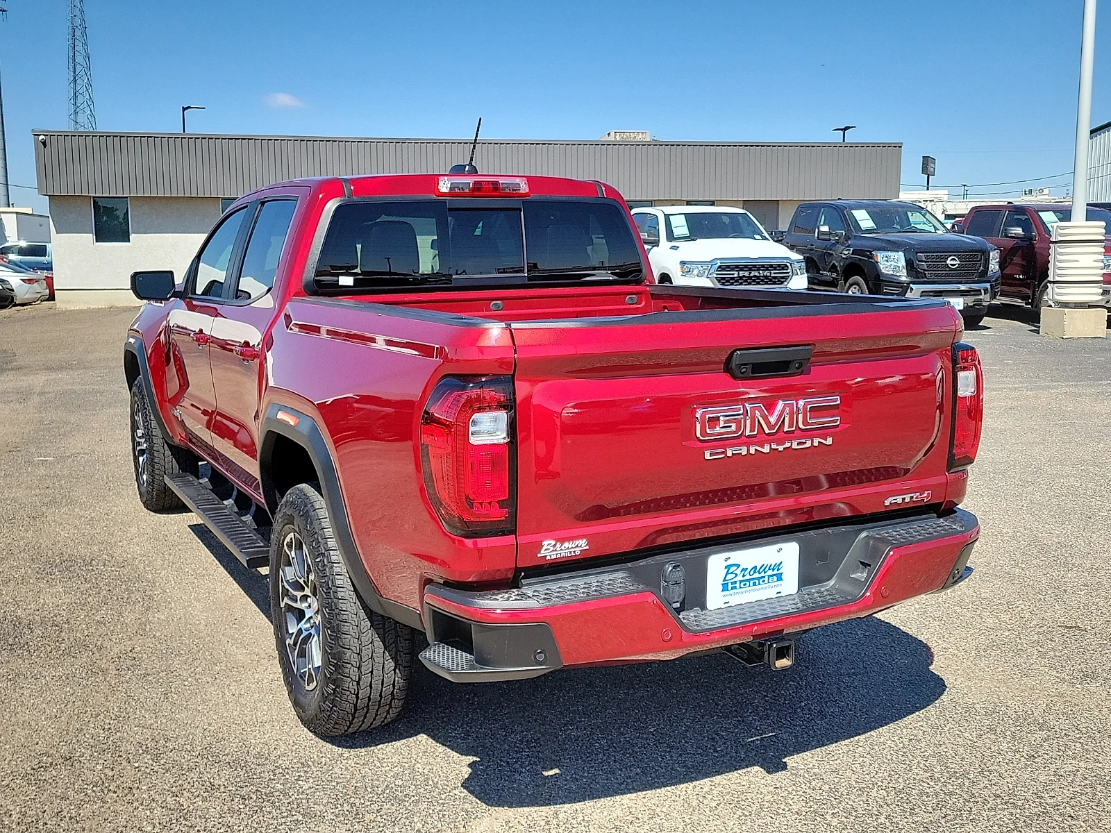 Certified Used 2024 Volcanic Red GMC 4WD AT4 image 8