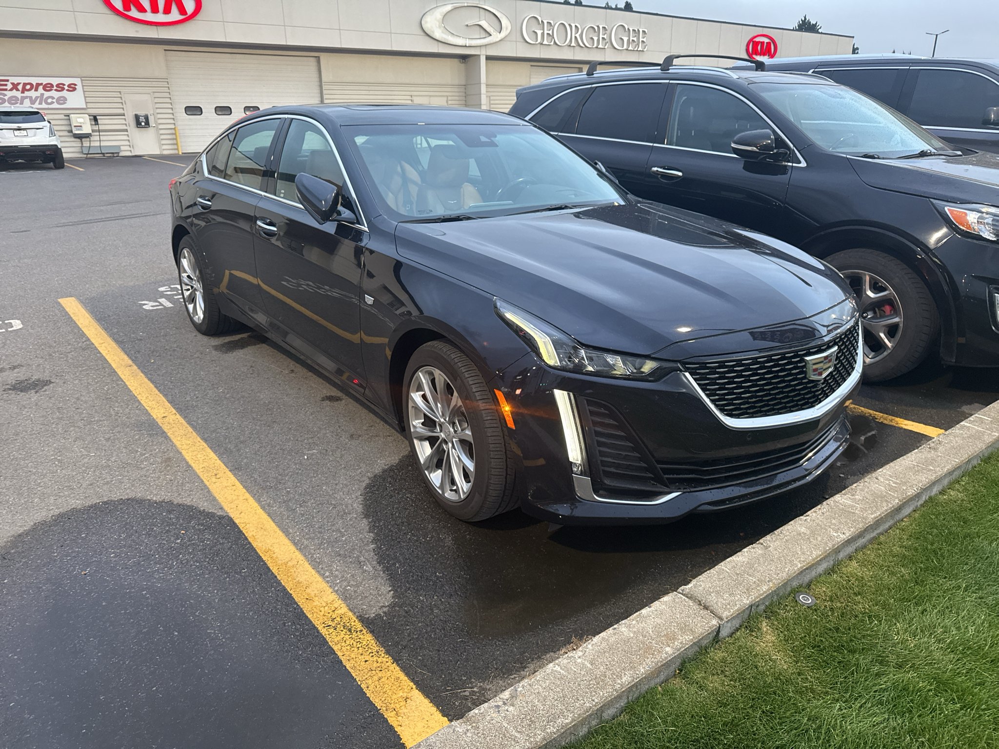 Used 2021 DARK MOON BLUE METALLIC Cadillac Premium Luxury image 2