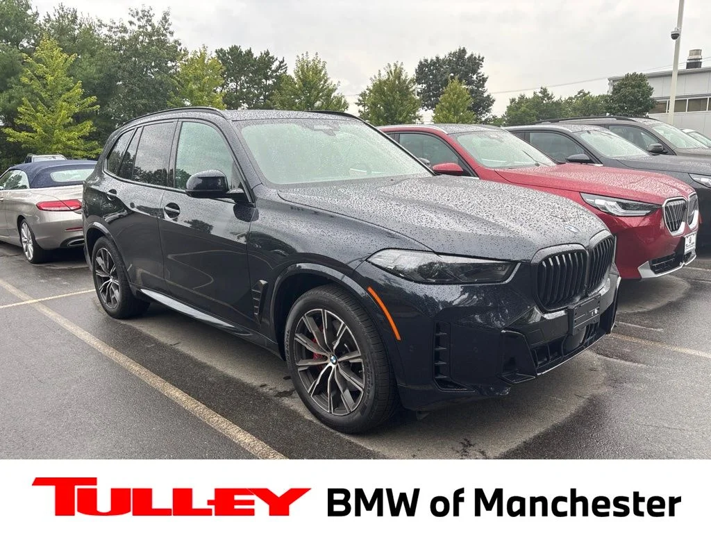 Certified Used 2025 Carbon Black Metallic BMW xDrive40i image 1