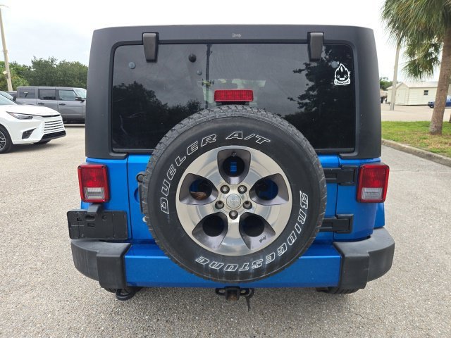 Used 2016 Hydro Blue Pearlcoat Jeep Sahara image 4