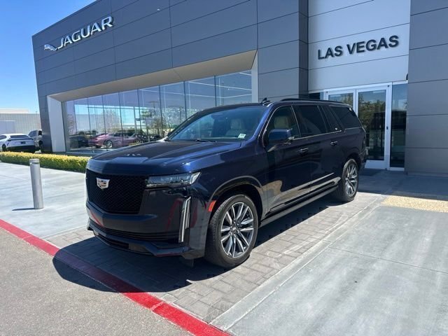 Used 2023 Blue Cadillac Sport image 1