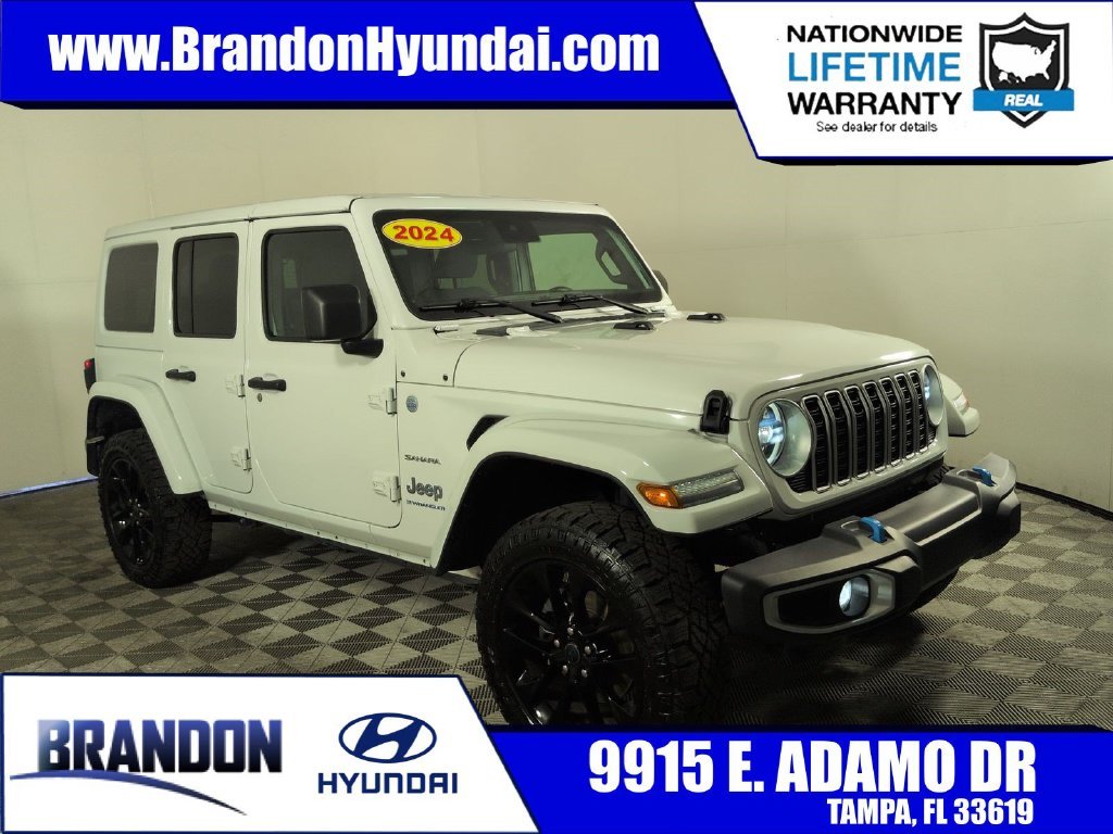 Used 2024 White Jeep Sahara 4xe image 1