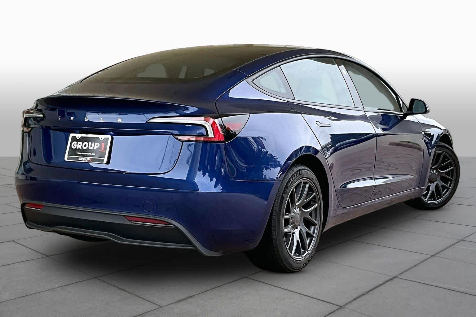 Used 2025 Solid Black Tesla Long Range image 10