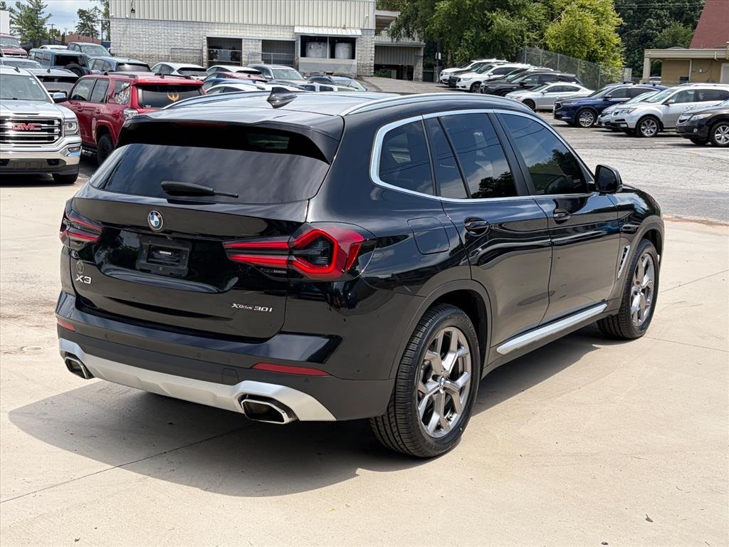 Used 2023 Black Sapphire Metallic BMW xDrive30i image 4