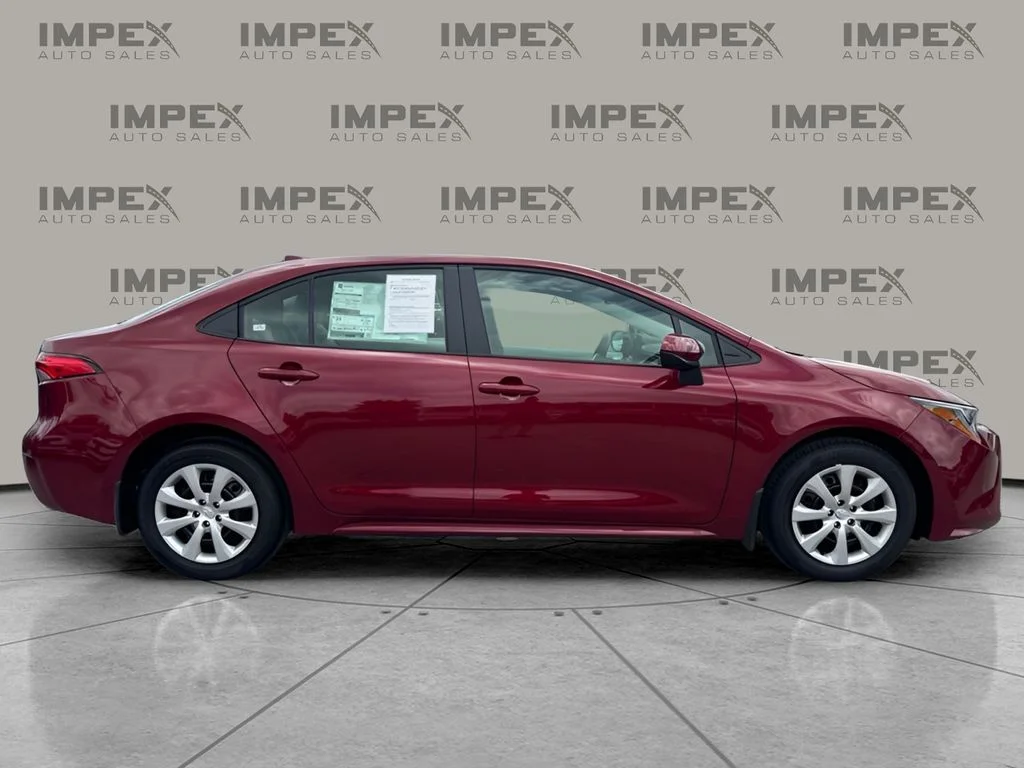 Used 2026 Red Toyota LE image 6