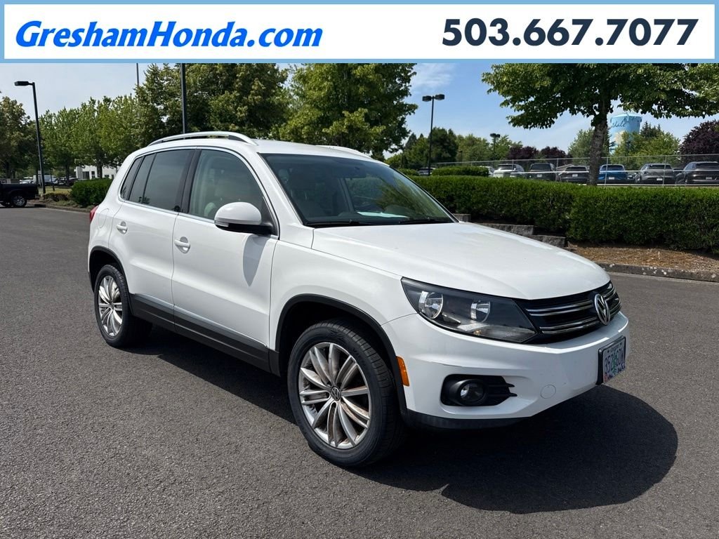 Used 2013 Candy White Volkswagen AWD One-Owner image 1