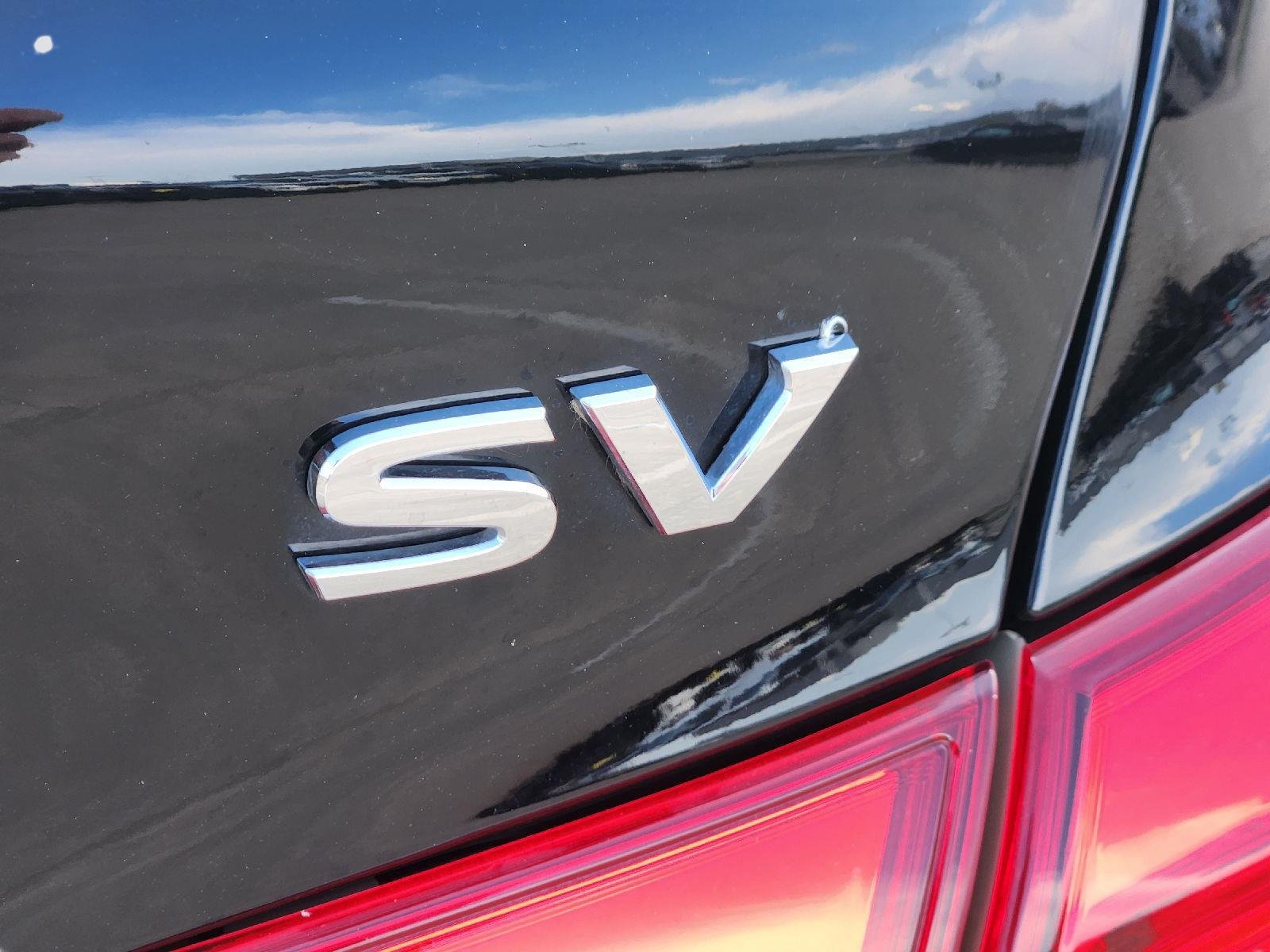 Used 2016 Super Black Nissan SV image 11