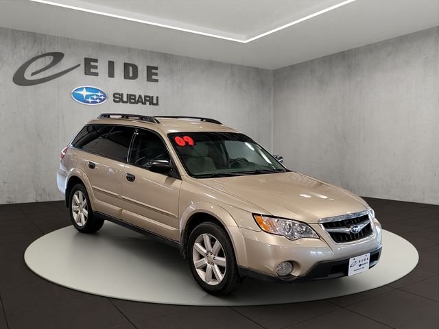 Used 2009 Harvest Gold Metallic Subaru 2.5i image 1