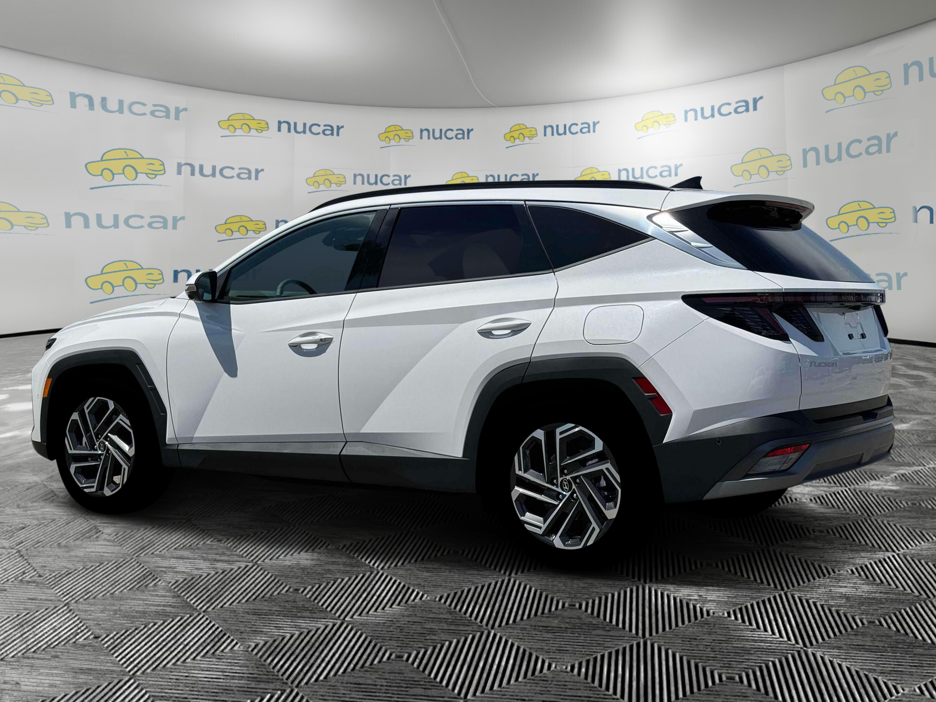 2026 Hyundai Tucson Limited in White at Nucar — photo 4
