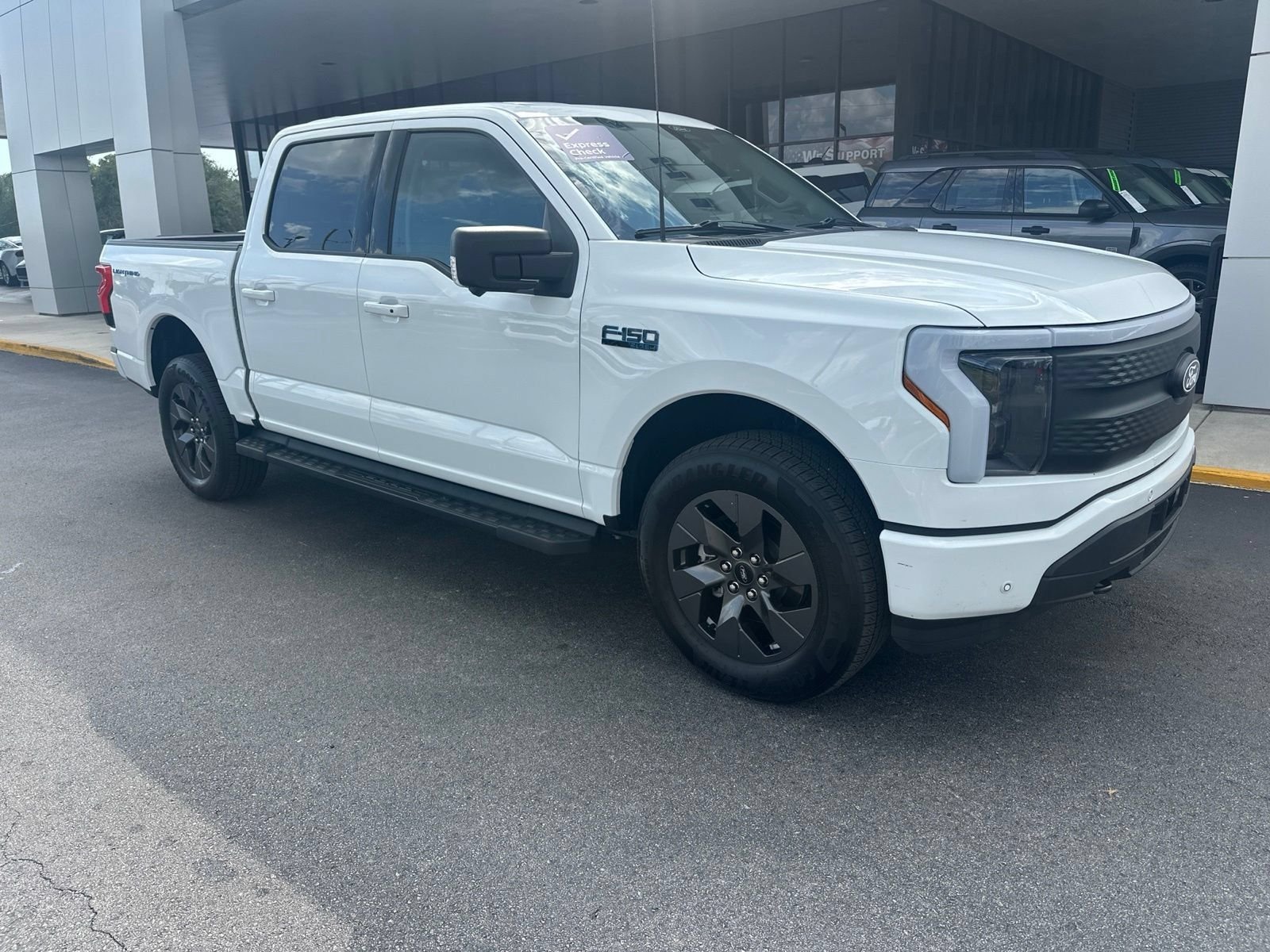Used 2025 Ford F-150 Lightning Flash with VIN 1FT6W3LU2SWG14962 for sale in Spring Hill, FL