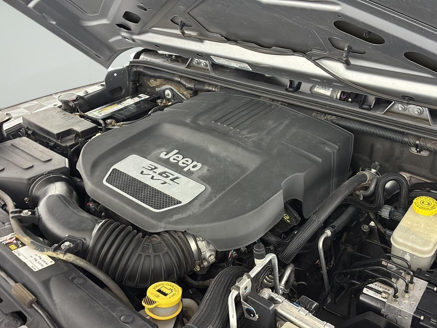 Used 2013 Billet Silver Metallic Jeep Sport image 11
