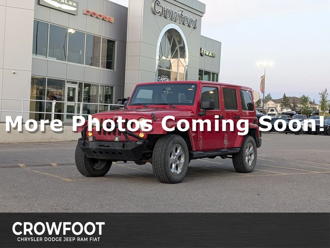 Used 2014 Red Jeep Sahara image 1
