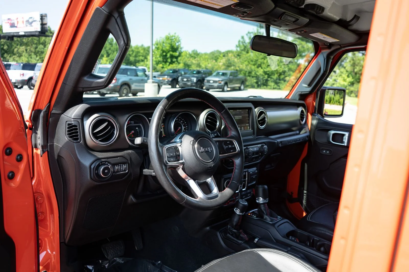 Used 2019 Orange Jeep Unlimited Rubicon image 13