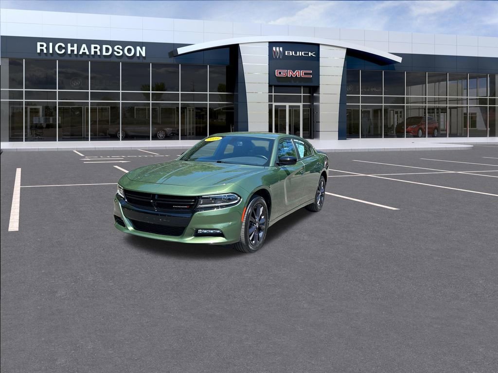 Used 2023 Green Dodge SXT AWD image 1