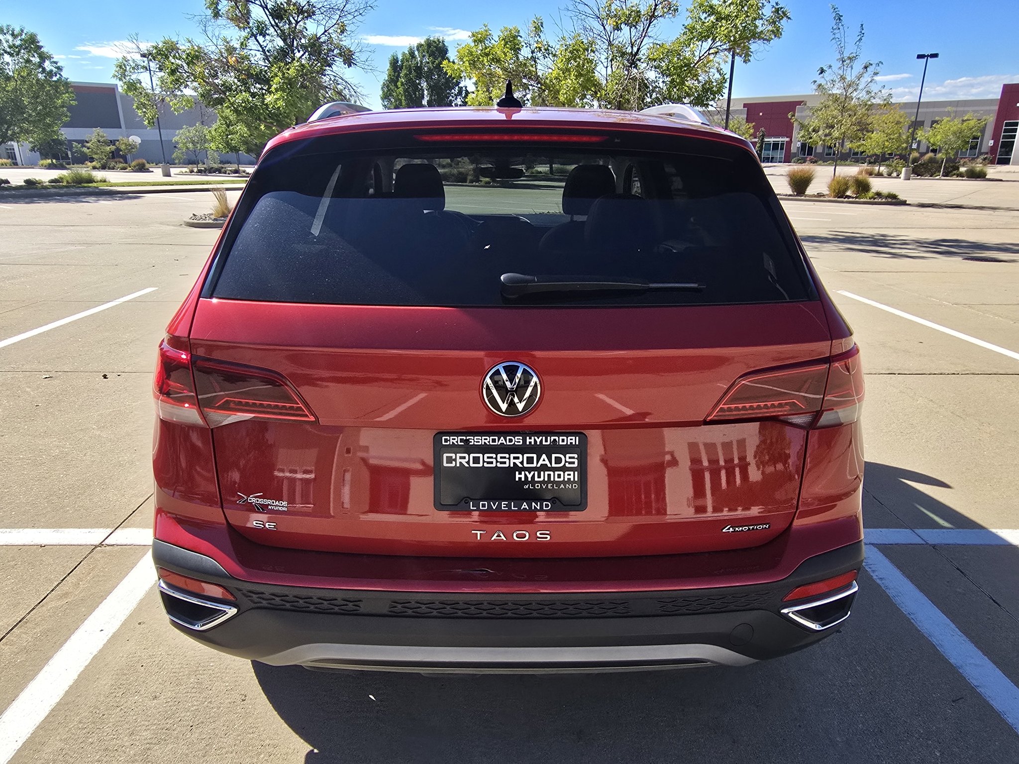Used 2024 Kings Red Metallic Volkswagen SE image 4