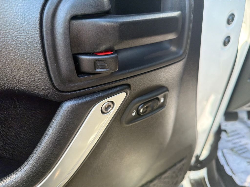 Used 2016 White Jeep Unlimited Sahara image 11