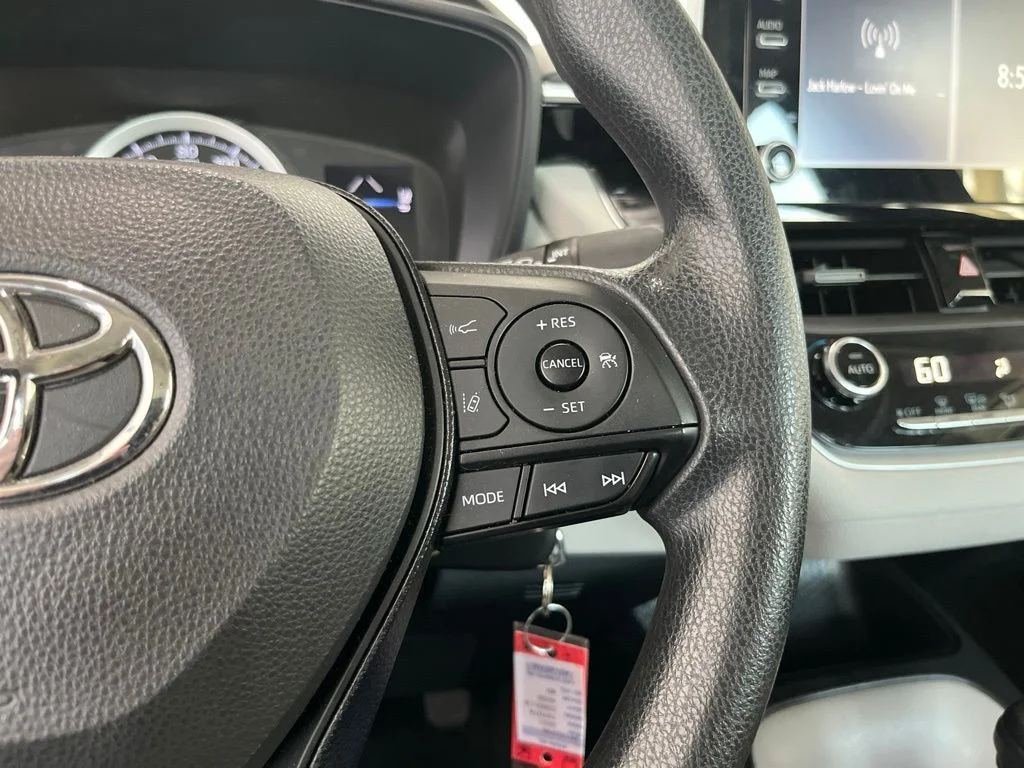 Used 2021 White Toyota LE image 7