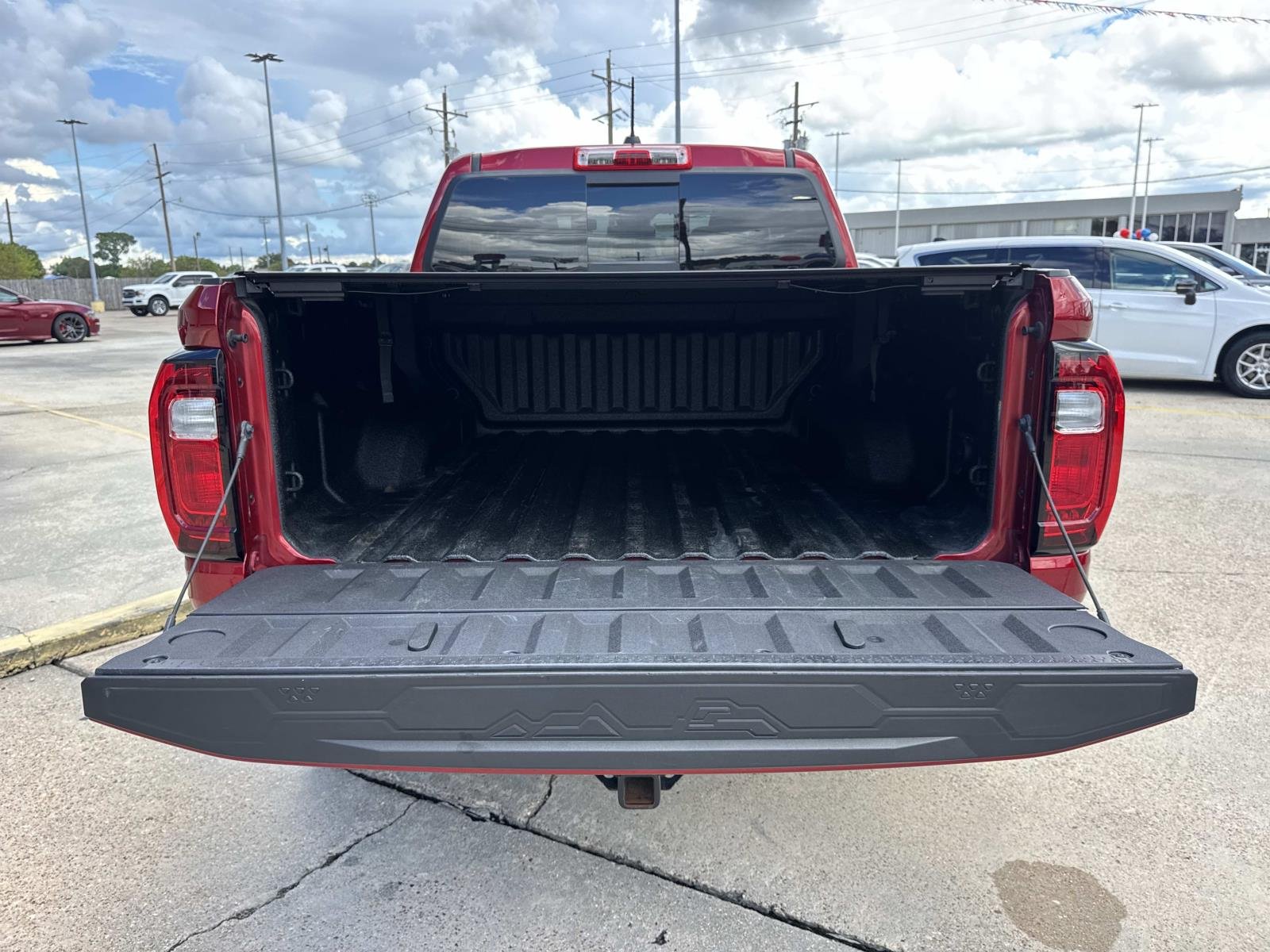 Used 2025 Volcanic Red Tintcoat GMC 2WD Elevation image 8