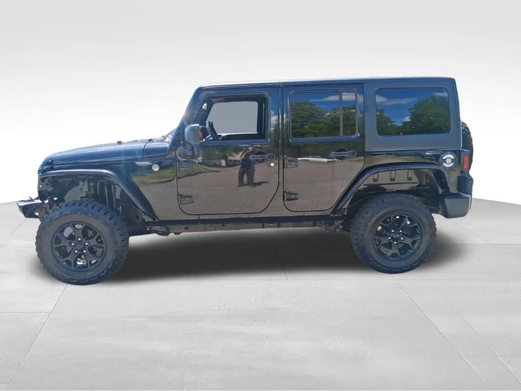 Used 2016 Black Jeep Unlimited Sport image 2