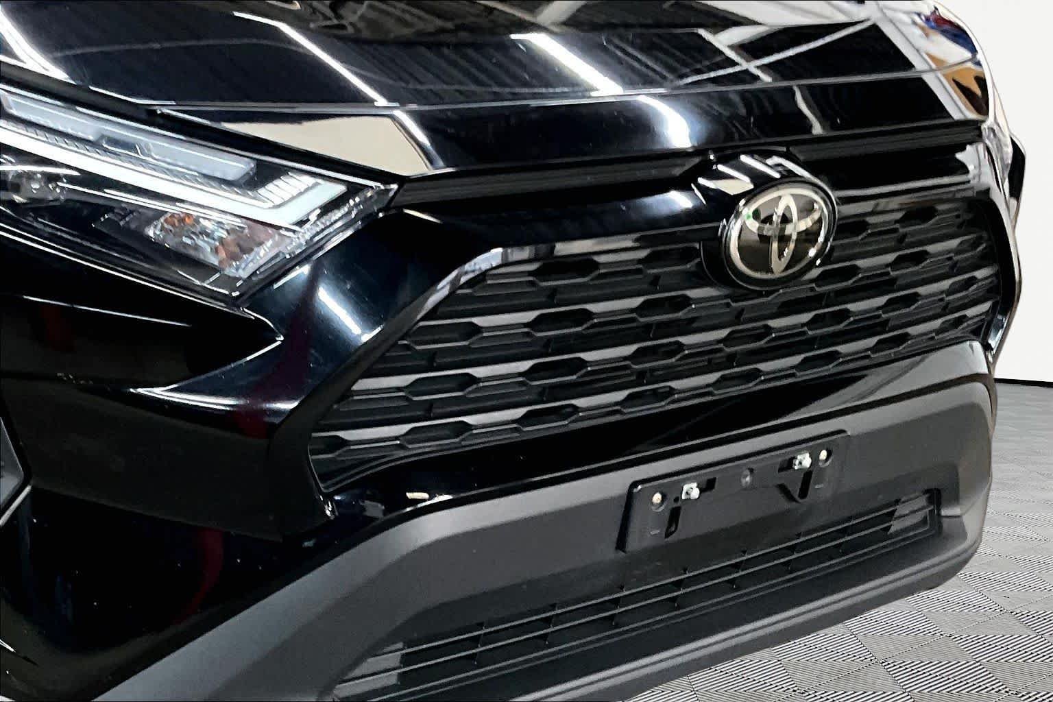 Used 2025 Midnight Black Metallic Toyota Hybrid LE image 30