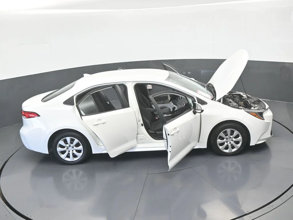 Used 2021 Super White Toyota LE image 58
