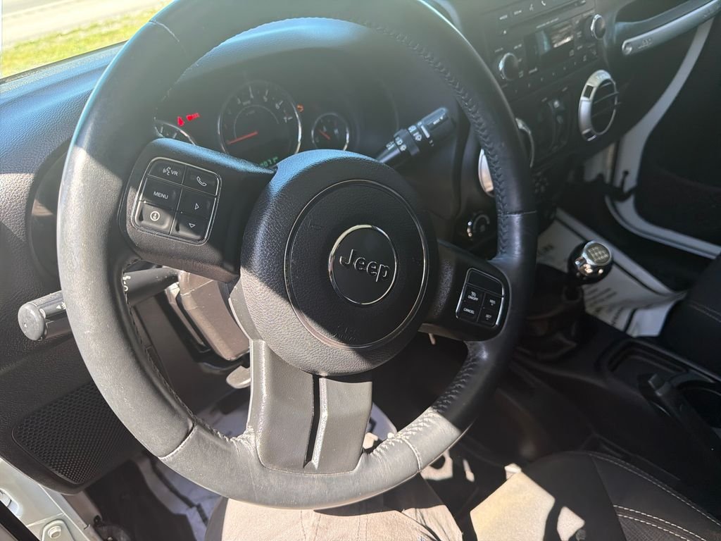 Used 2016 White Jeep Unlimited Sahara image 14