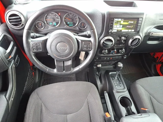 Used 2016 Red Jeep Unlimited Sport image 11