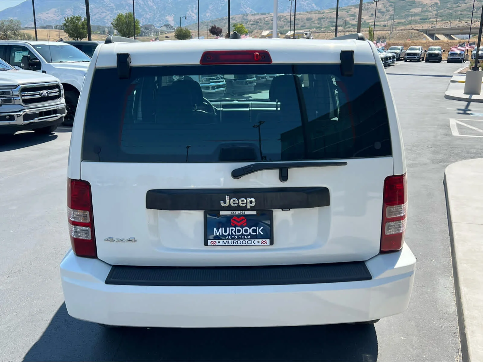 Used 2010 Stone White Clearcoat Jeep Sport image 9