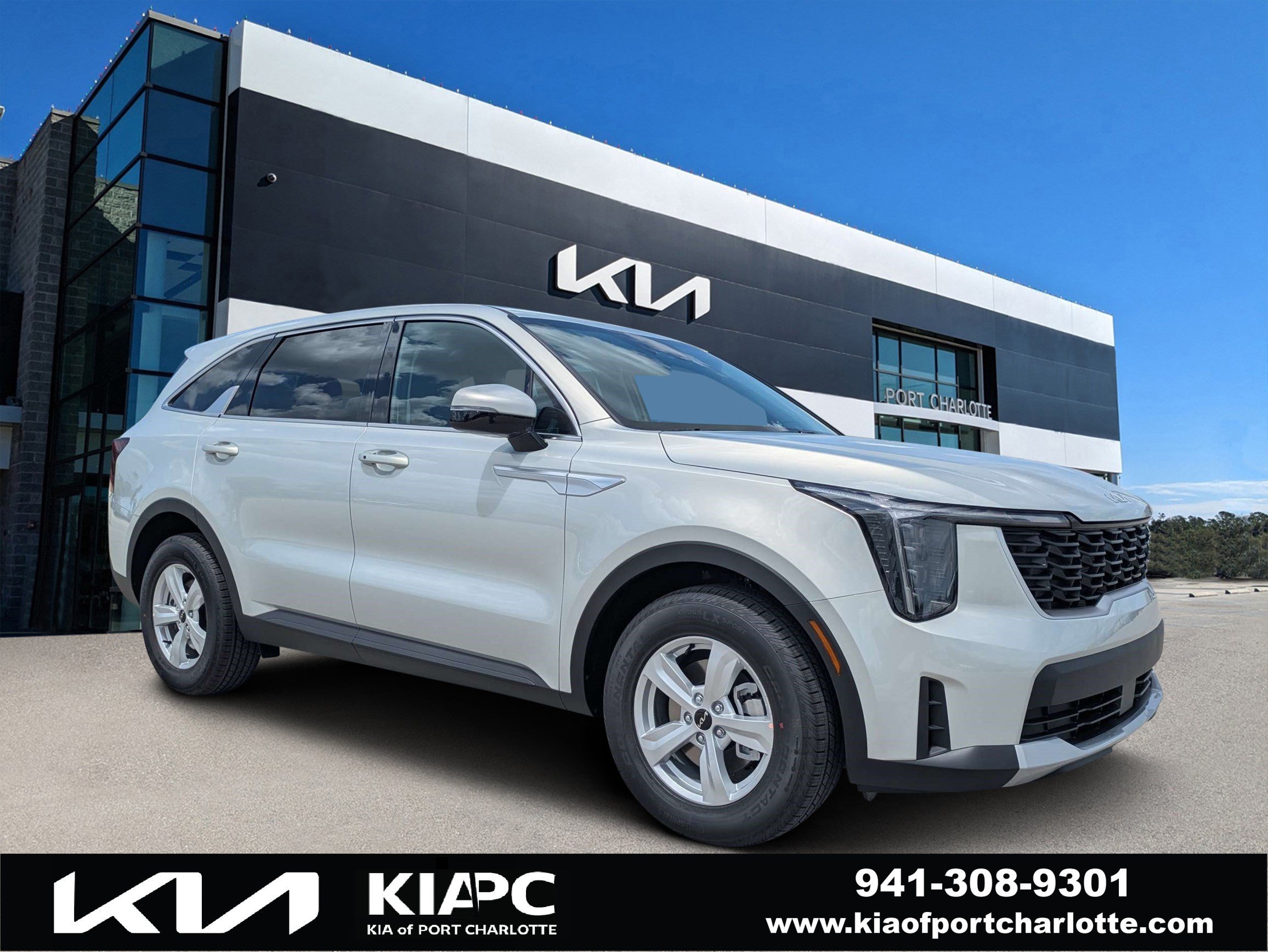 New 2026 Ivory Silver Kia LX image 1
