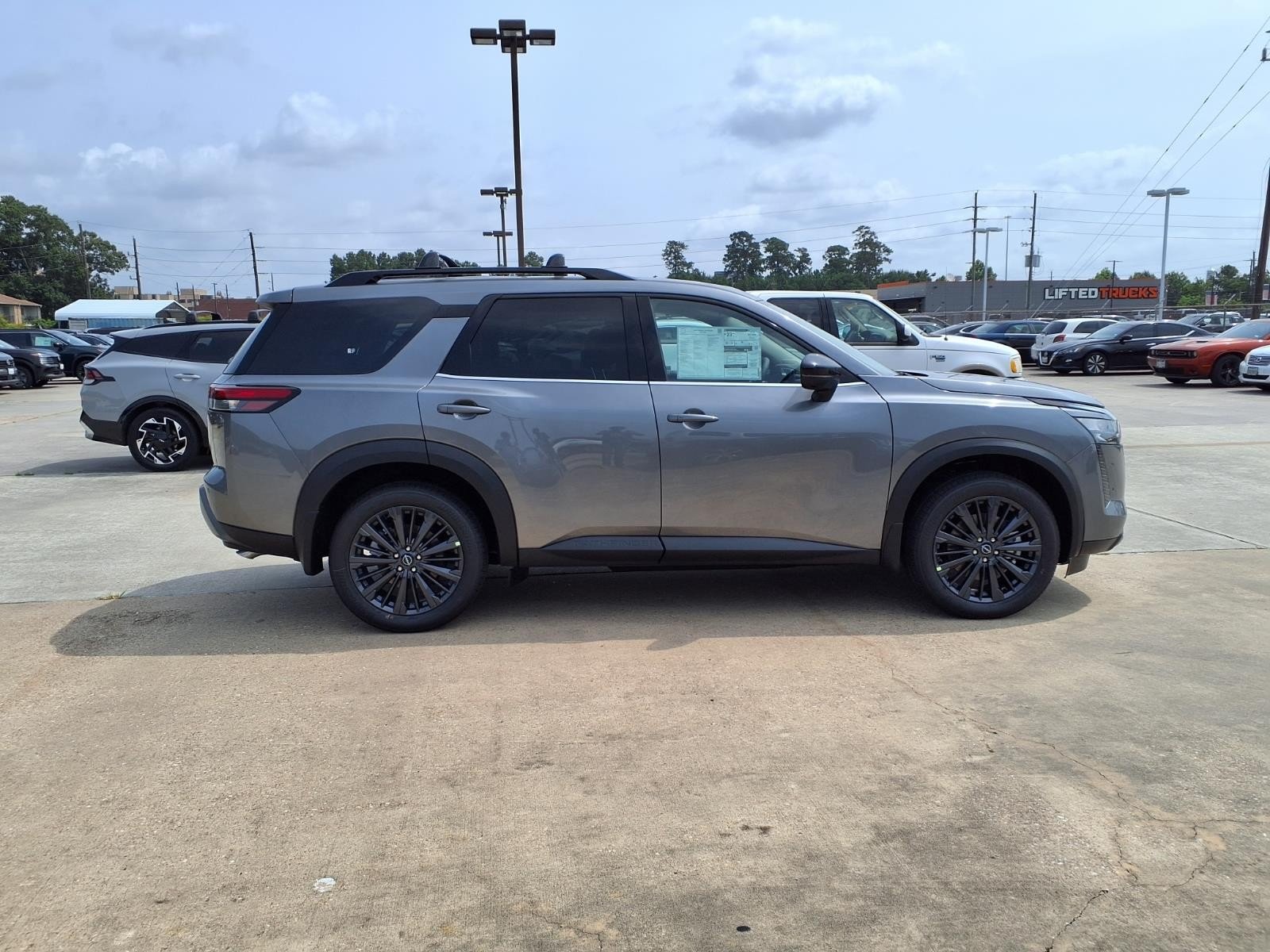 New 2026 Gun Metallic Nissan SL image 4