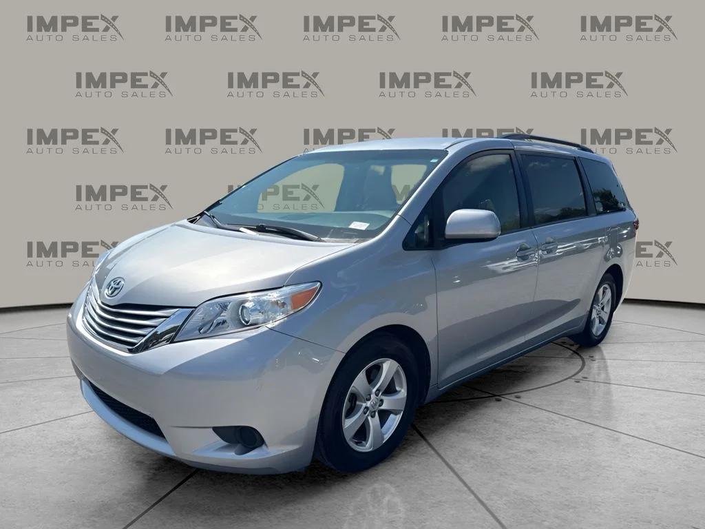 Used 2015 Silver Toyota LE image 1