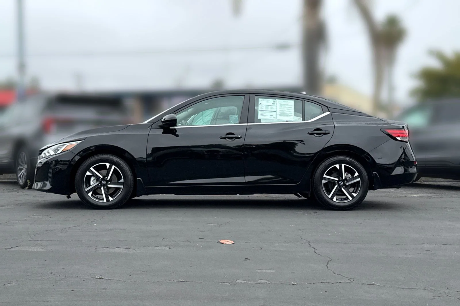 Certified Used 2024 Black Nissan SV image 31