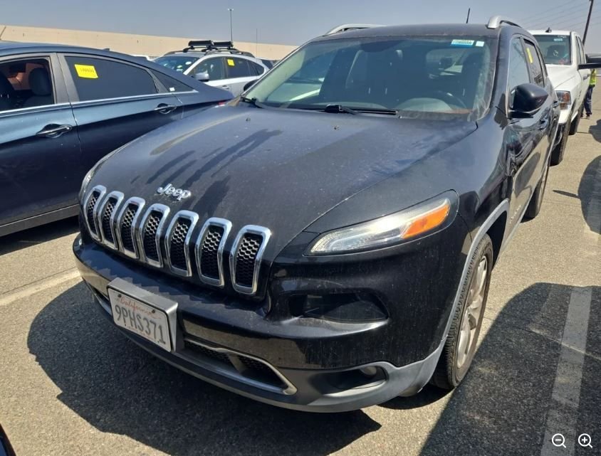 Used 2016 Black Jeep Limited image 1