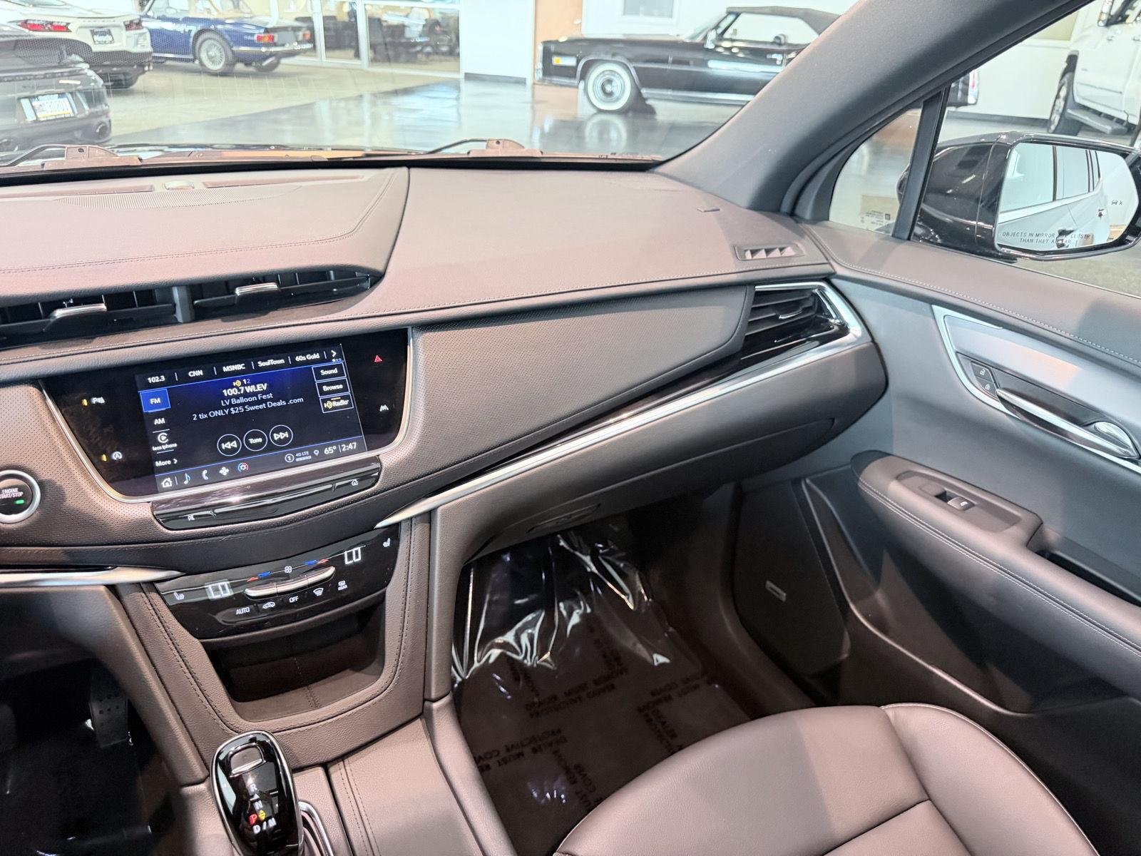 Used 2024 Stellar Black Metallic Cadillac AWD Luxury image 44