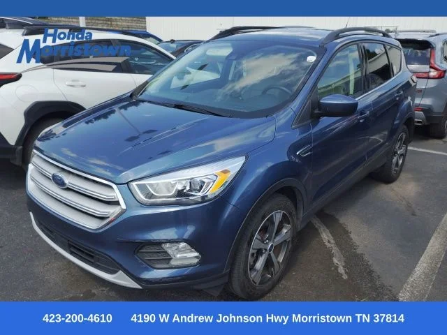 Used 2018 Blue Metallic Ford SEL image 1