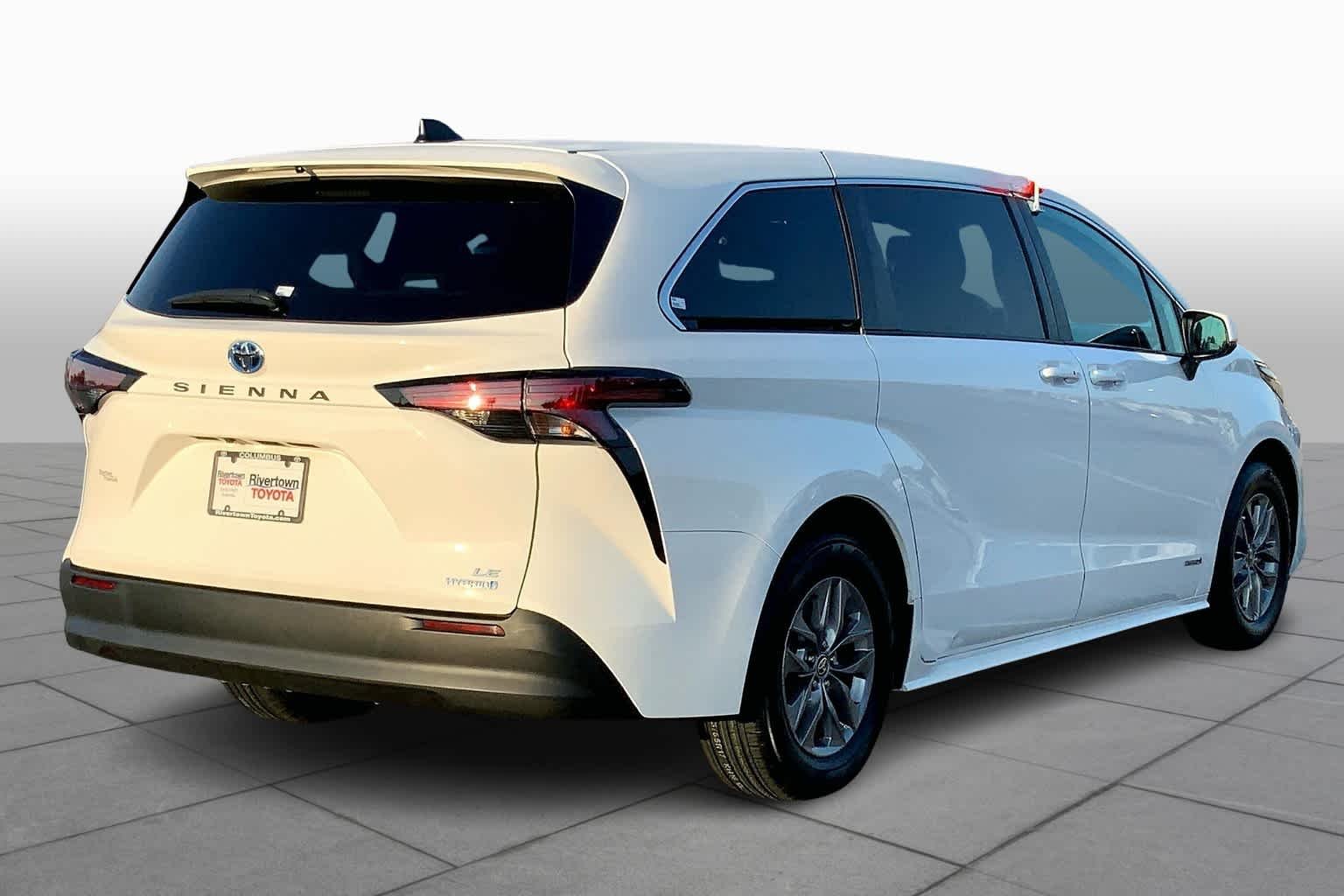 Used 2021 Super White Toyota LE image 13