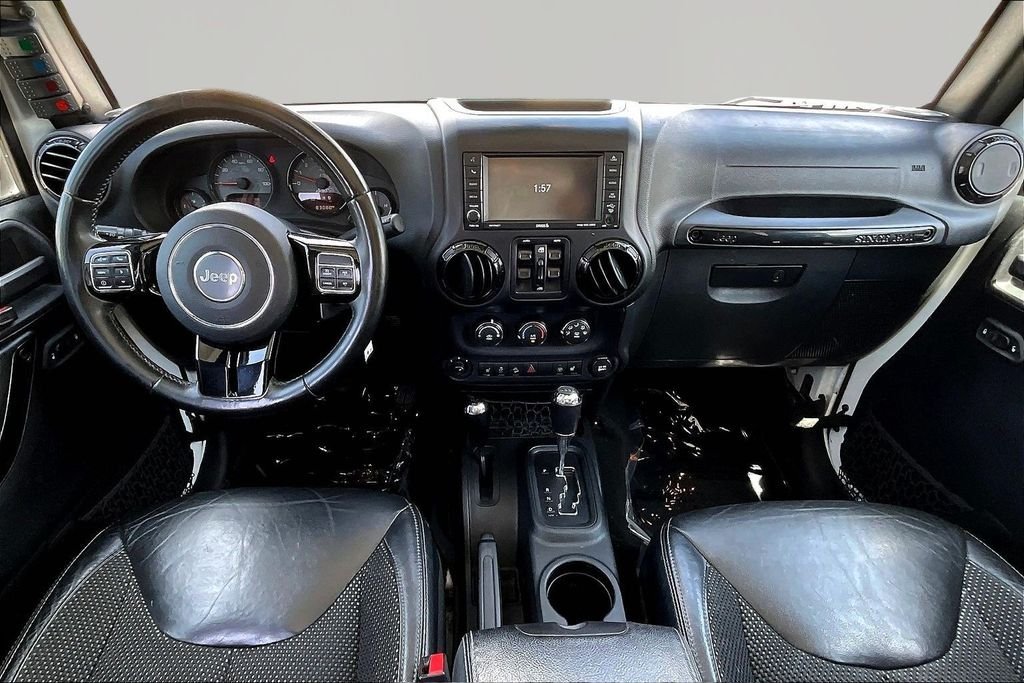 Used 2016 White Jeep Unlimited Sahara image 7