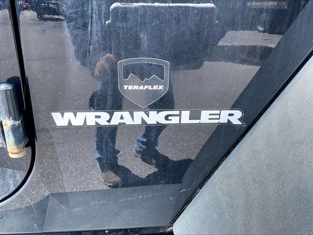 Used 2013 Black Clearcoat Jeep Sport image 7
