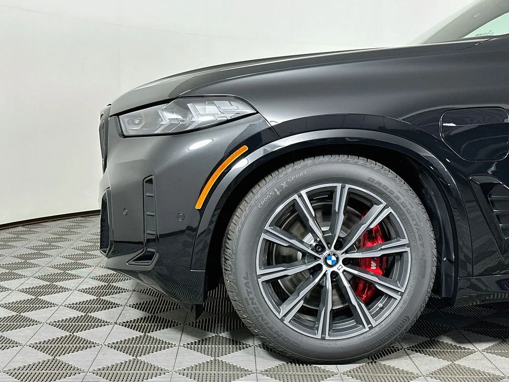 New 2026 Black Sapphire Metallic BMW xDrive50e image 9