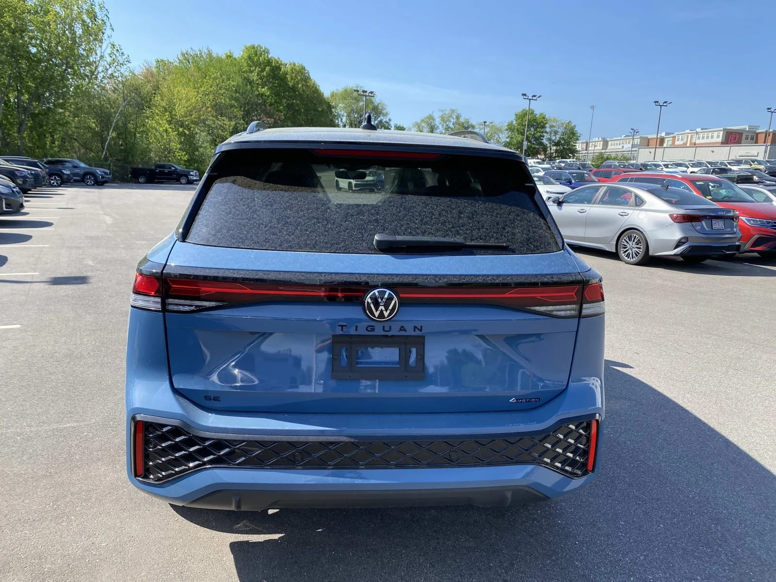New 2026 Monterey Blue Pearl Volkswagen SE R-Line Black 4MOTION image 3