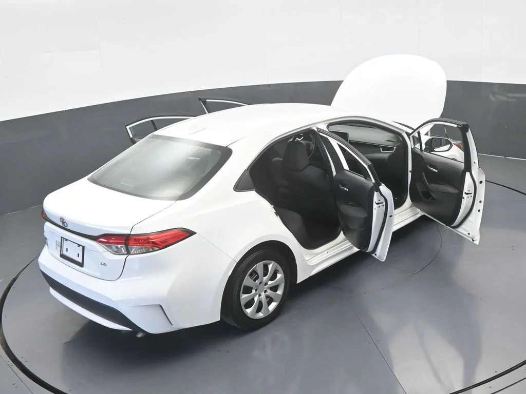 Used 2021 Super White Toyota LE image 57