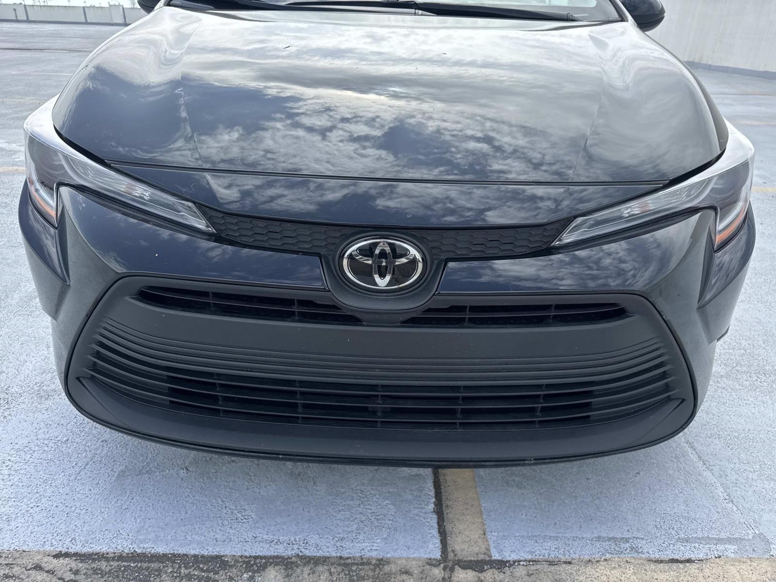Used 2025 Midnight Black Metallic Toyota LE image 12